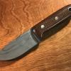 Camp Knife - Hammer forged from 1095 high carbon steel. Special heat treating with etching on the blade. Burlap Micarta handle. OAL of 9". $350.