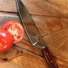 This Chef knife in 440C stainless steel will pass the ultra test - slicing a tomato. 11" OAL, Kirinite handle. $400.